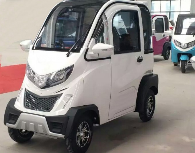 Hot Sales Factory Four Wheels Electric Car Image1