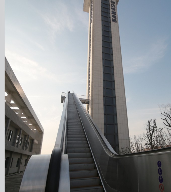Outside Escalator with High Rise Image1
