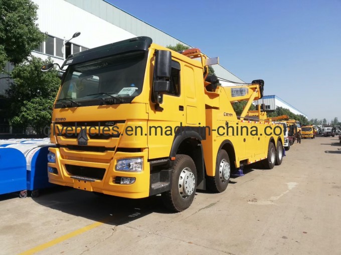HOWO Heavy Duty 50t 60t Wrecker Tow Truck Rotator Image1